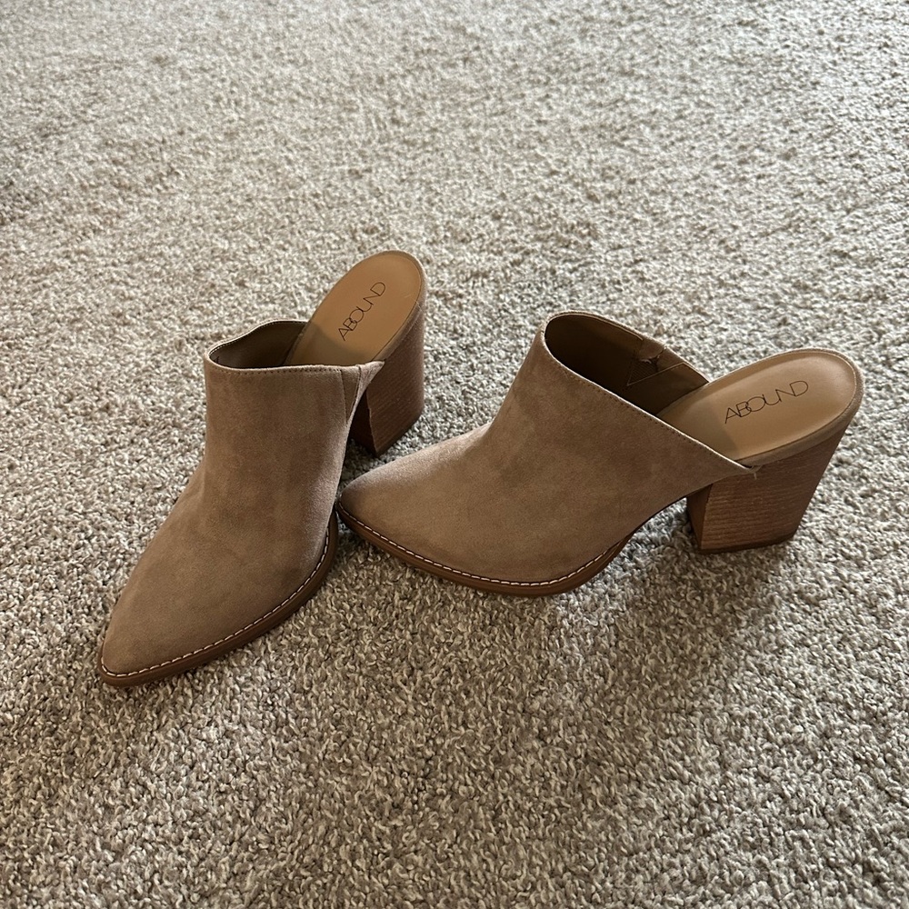 Shorter heel slip on mules.